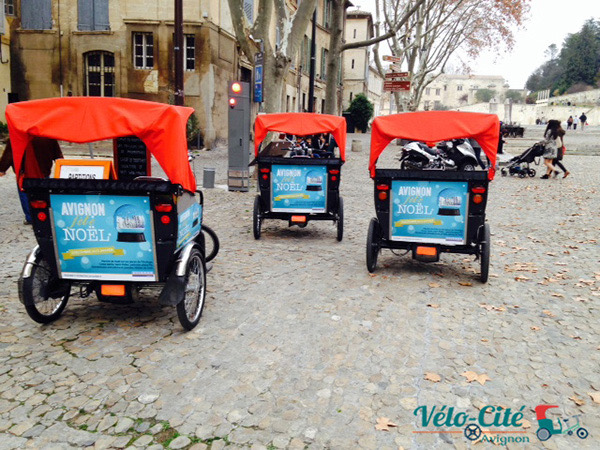 Advertising wrap on a bike taxi in Avignon