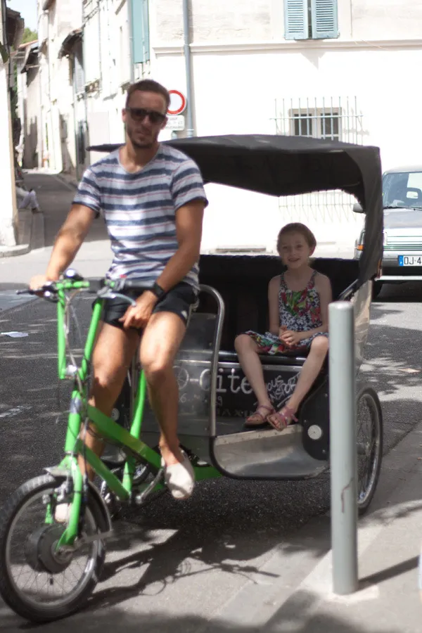 Vélo-Cité bike taxi in the streets of Avignon